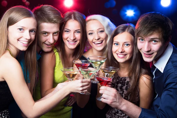 Friends clinking by glasses — Stock Photo, Image