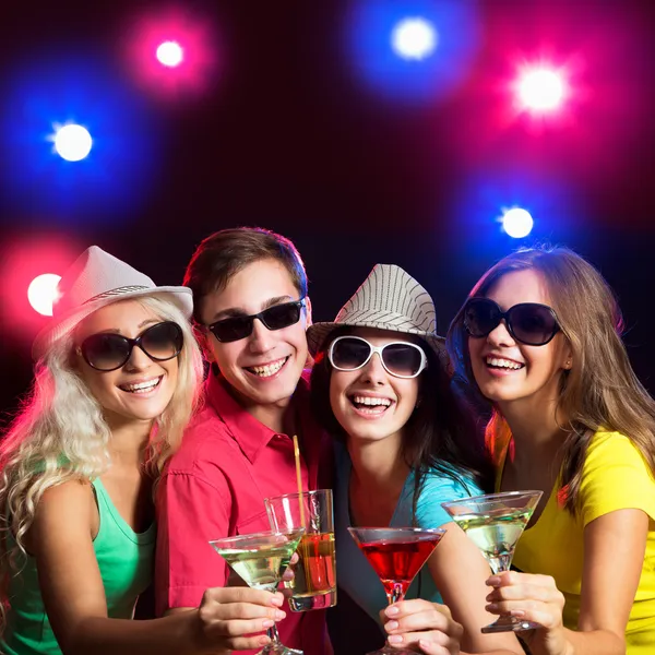 Friends touching the glasses with each other — Stock Photo, Image