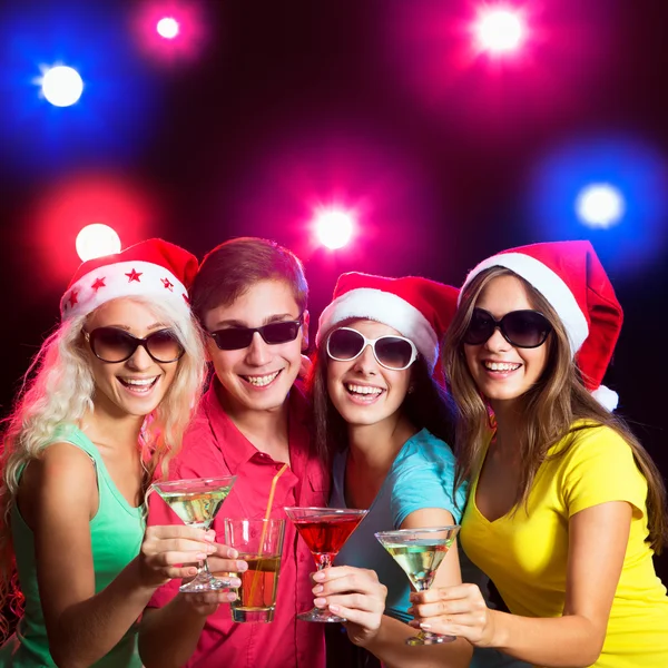 Friends touching the glasses with each other — Stock Photo, Image