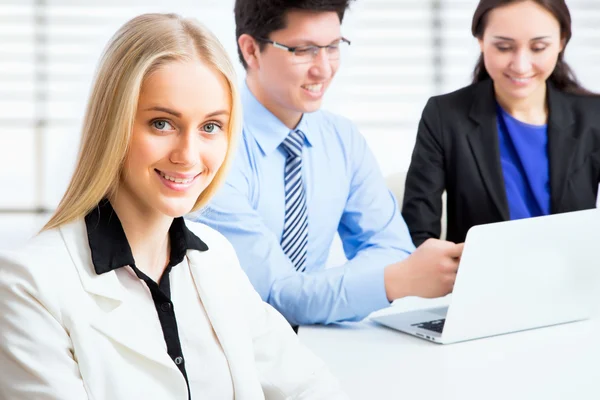 Business woman and her collegues — Stock Photo, Image