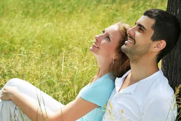 Portrait of attractive young couple in love outdoors. — Stock Photo, Image
