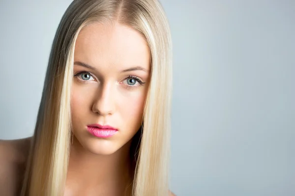 Beautiful young woman with a long hair — Stock Photo, Image