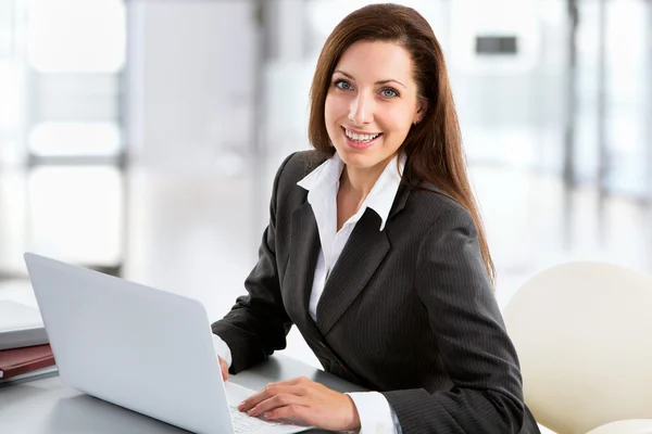 Business woman working with laptop Royalty Free Stock Images