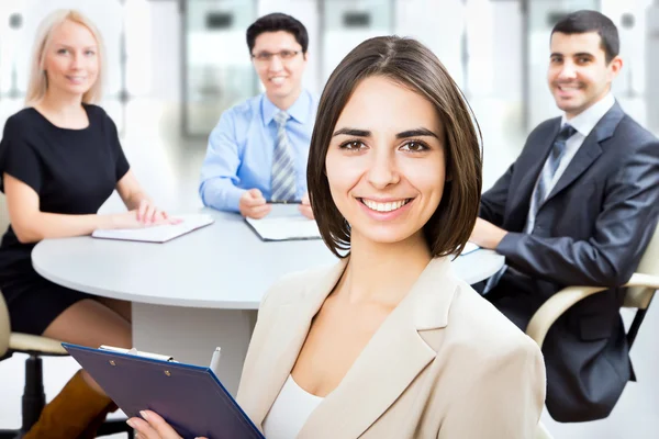 Business woman with colleagues — Stock Photo, Image