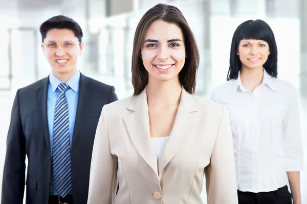 Empresarios con líder femenino —  Fotos de Stock