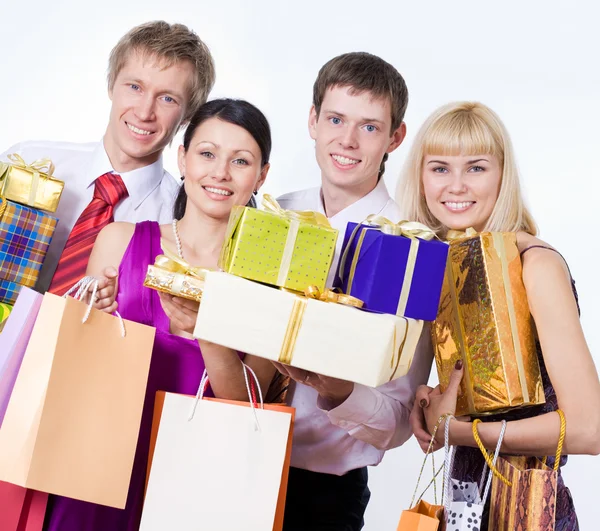 Happy people with gift boxes — Stock Photo, Image