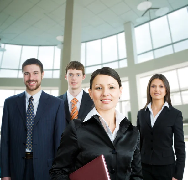 Empresária e sua equipe — Fotografia de Stock