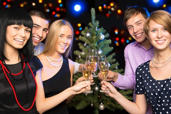 Friends celebrating Christmas — Stock Photo, Image