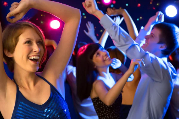 Beautiful girl dancing at a party — Stock Photo, Image