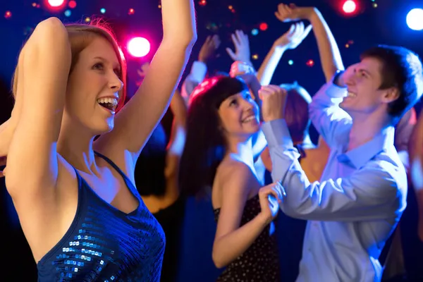 Beautiful girl dancing at a party — Stock Photo, Image