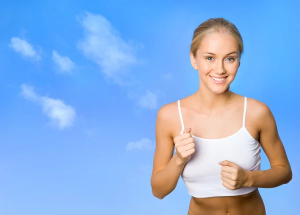 Joven mujer corriendo —  Fotos de Stock