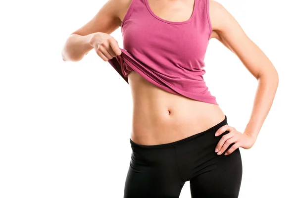 Woman shows her belly — Stock Photo, Image