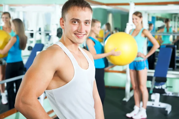 Fitness instructor with gym people — Stock Photo, Image