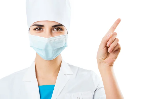 Vrouwelijke arts in een masker — Stockfoto