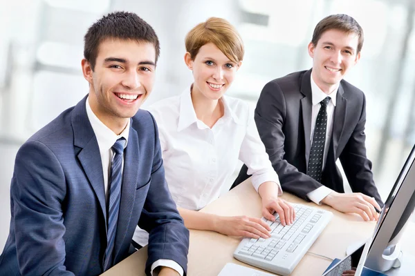 Business people looking at camera — Stock Photo, Image