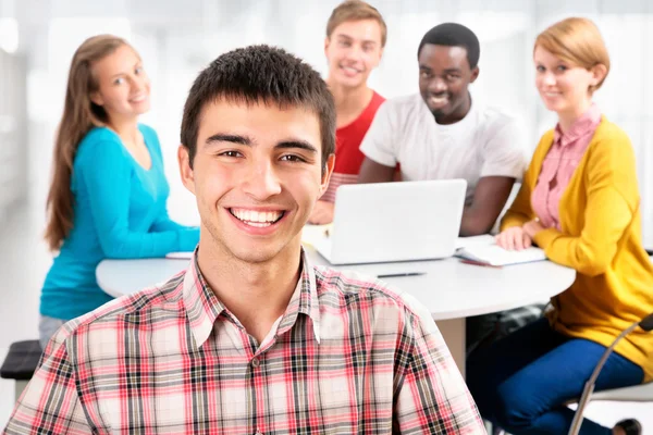 Pretty  student and his friends — Stock Photo, Image