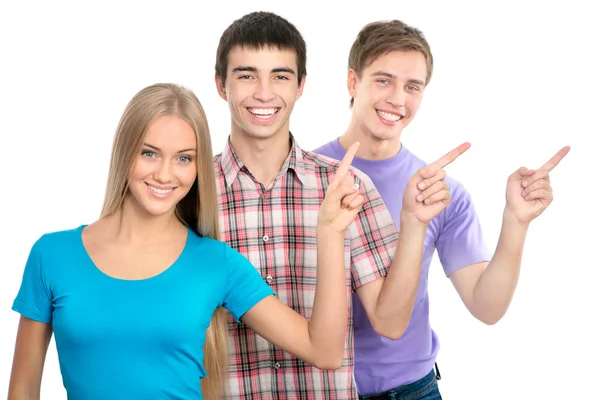 Estudantes apontando sobre fundo branco — Fotografia de Stock