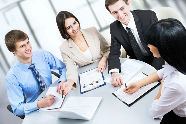 Business people working at meeting Stock Picture