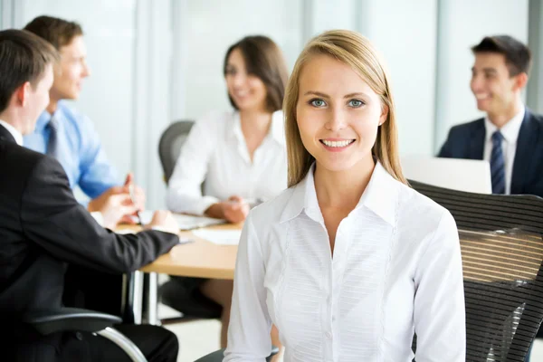 Business woman with team — Stock Photo, Image