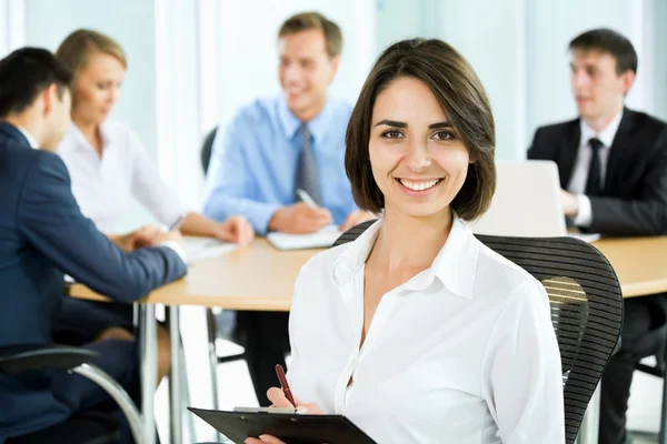 Business woman with team — Stock Photo, Image