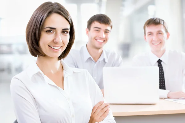 Business woman with her staff — Stock Photo, Image