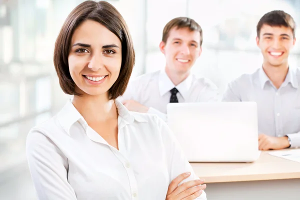 Business woman with her staff — Stock Photo, Image