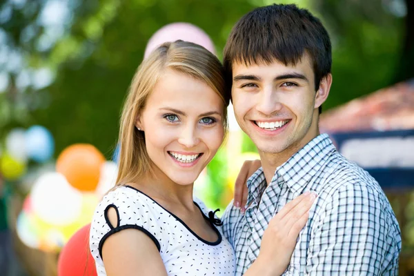Young woman embracing her boyfriend — Stock Photo, Image