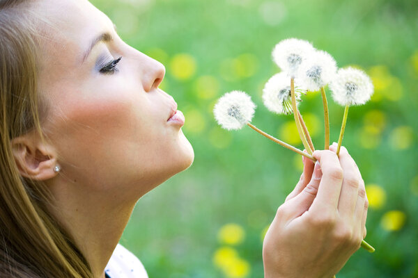 Woman with dandelions