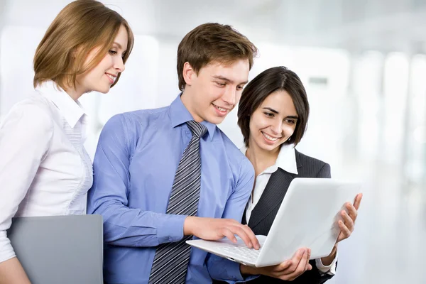 Businesspeople with laptop — Stock Photo, Image