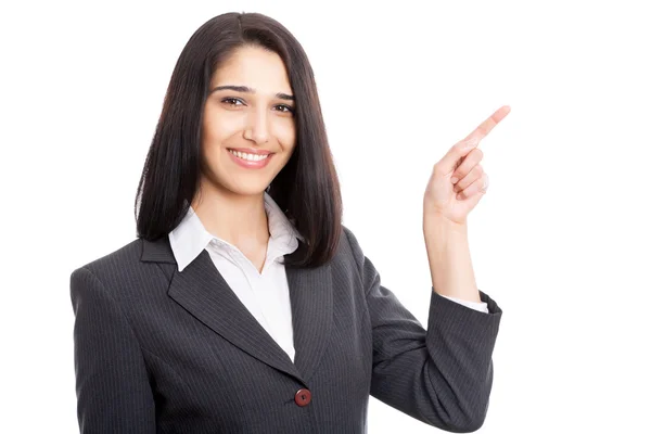 Mujer de negocios señalando fondo blanco — Foto de Stock