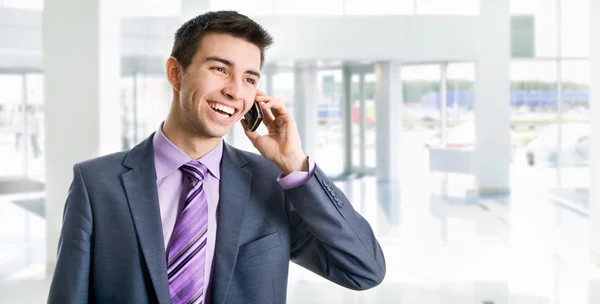 Young businessman on mobile — Stock Photo, Image
