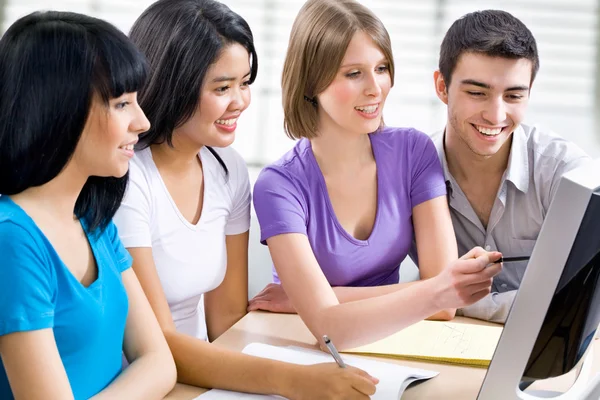 Young students studying together Royalty Free Stock Images