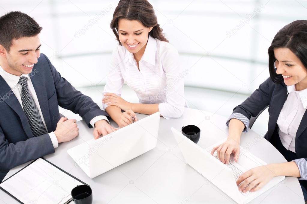 Business people with laptops