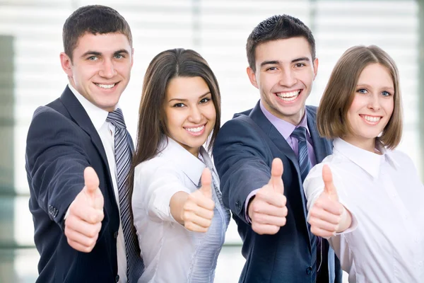 Business people showing thumb up — Stock Photo, Image