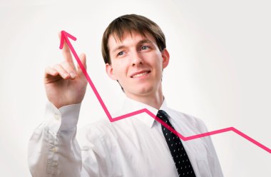 grafikte işaret eden işadamı