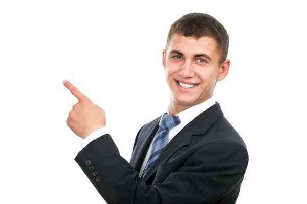 Businessman pointing at copy space — Stock Photo, Image