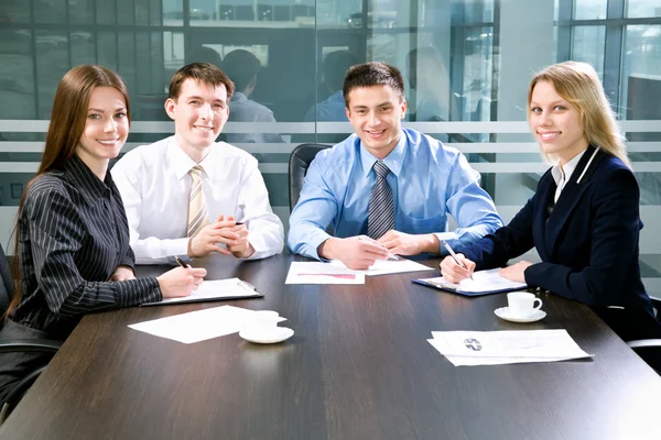 Businesspeople look at camera — Stock Photo, Image