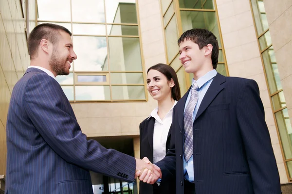 Businesspeople shake hands — Stock Photo, Image