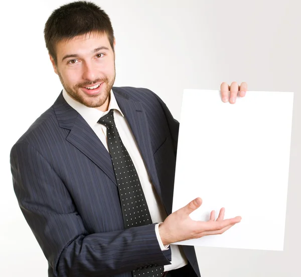 Businessman with blank paper — Stock Photo, Image