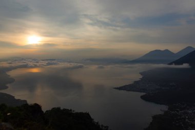 sunset sky, lake water in mountains landscape 