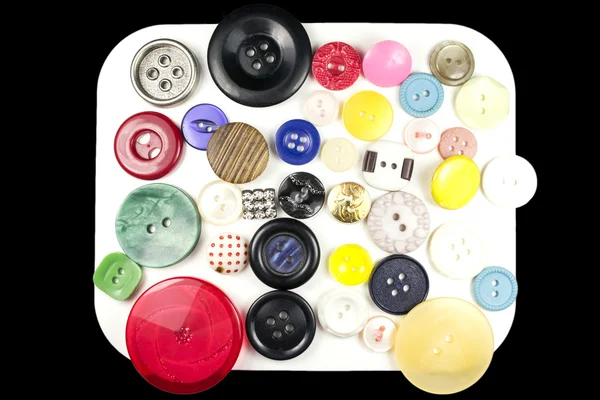 Various sewing buttons with a thread — Stock Photo, Image