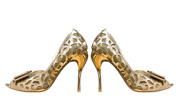 Χρυσό γυναίκες παπούτσια που απομονώνονται σε λευκό φόντο. — Φωτογραφία Αρχείου
