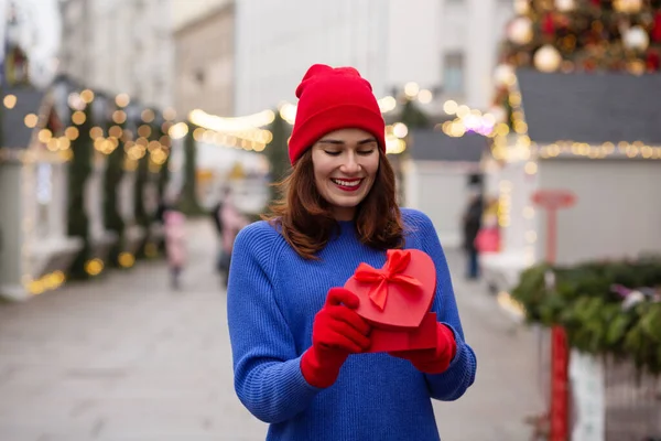 Merry Young Woman Receiving Gift Box Christmas Fair — Stock Photo, Image