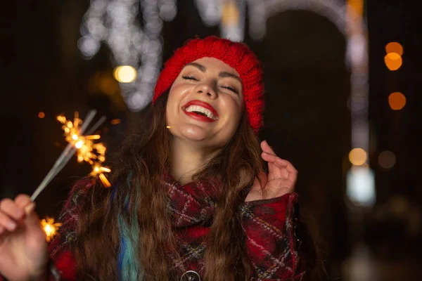 Laughing Woman Red Hat Having Fun Sparkling Lights Outdoor Evening — Stock Photo, Image
