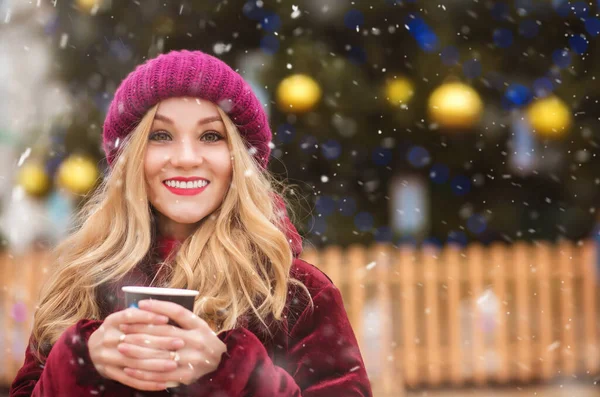 Lovely Blond Woman Wears Red Knitted Cap Drinking Coffee Winter — Stock Photo, Image