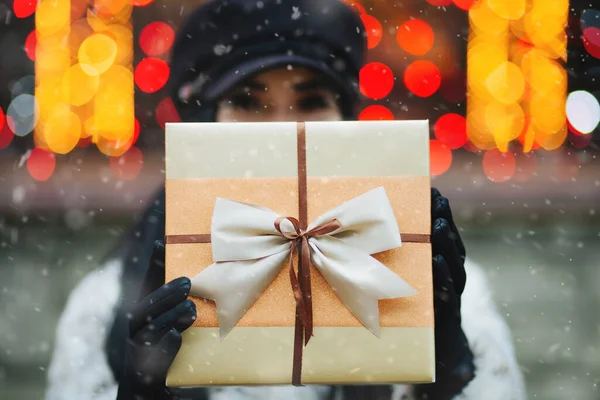 Adorable Young Woman Wearing Fur Coat Cap Pulls Gift Box — Stock Photo, Image