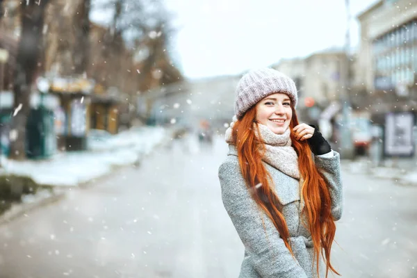 Pleased Red Haired Woman Wears Coat Walking City Snowfall Space — Stock Photo, Image