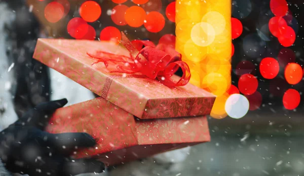 Woman Receiving Gift Box Bokeh Background Empty Space — Stock Photo, Image