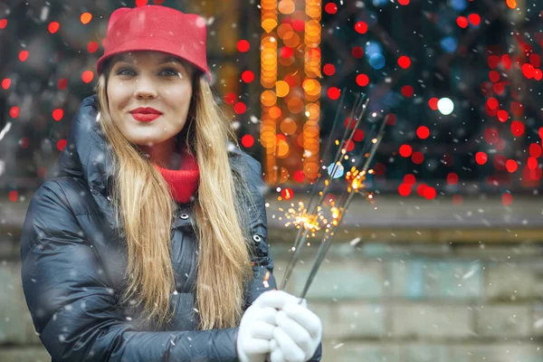 Merry Blond Woman Wears Red Hat Playing Bengal Lights Holiday — Stock Photo, Image