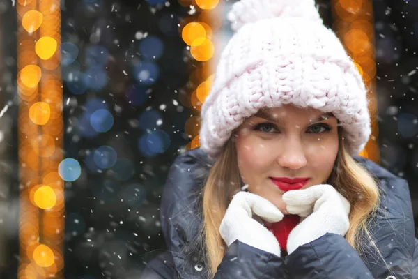 Pleased Blond Woman Wears Knit Cap Walking Winter Fair Snowfall — Stock Photo, Image